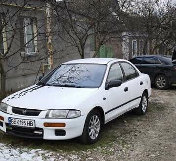 Білий Мазда 323, об'ємом двигуна 1.5 л та пробігом 398 тис. км за 1500 $, фото 1 на Automoto.ua
