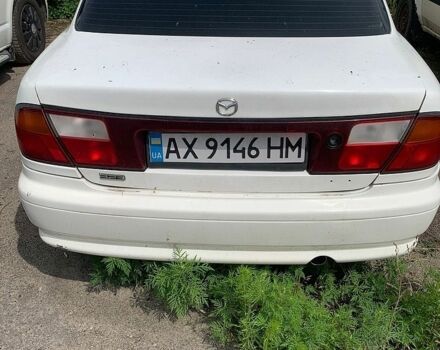 Белый Мазда 323, объемом двигателя 1.5 л и пробегом 235 тыс. км за 500 $, фото 1 на Automoto.ua