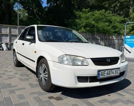 Білий Мазда 323, об'ємом двигуна 1.5 л та пробігом 270 тис. км за 1400 $, фото 1 на Automoto.ua