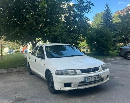 Белый Мазда 323, объемом двигателя 1.49 л и пробегом 235 тыс. км за 1399 $, фото 1 на Automoto.ua