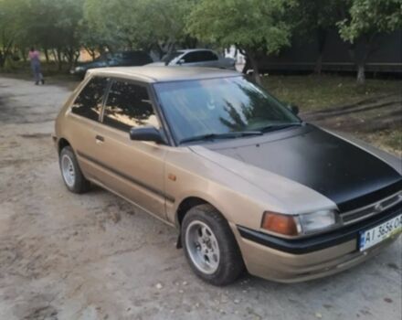 Бежевый Мазда 323, объемом двигателя 1.3 л и пробегом 323 тыс. км за 1500 $, фото 6 на Automoto.ua