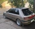 Бежевый Мазда 323, объемом двигателя 1.3 л и пробегом 323 тыс. км за 1500 $, фото 5 на Automoto.ua