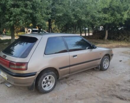 Бежевый Мазда 323, объемом двигателя 1.3 л и пробегом 323 тыс. км за 1500 $, фото 2 на Automoto.ua