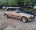 Бежевый Мазда 323, объемом двигателя 1.3 л и пробегом 323 тыс. км за 1500 $, фото 3 на Automoto.ua