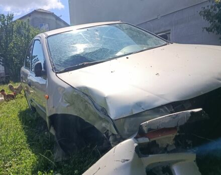 Бежевый Мазда 323, объемом двигателя 1.5 л и пробегом 280 тыс. км за 890 $, фото 4 на Automoto.ua