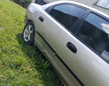 Бежевый Мазда 323, объемом двигателя 1.5 л и пробегом 280 тыс. км за 890 $, фото 3 на Automoto.ua