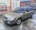 Бежевий Мазда 323, об'ємом двигуна 1.84 л та пробігом 291 тис. км за 3000 $, фото 6 на Automoto.ua