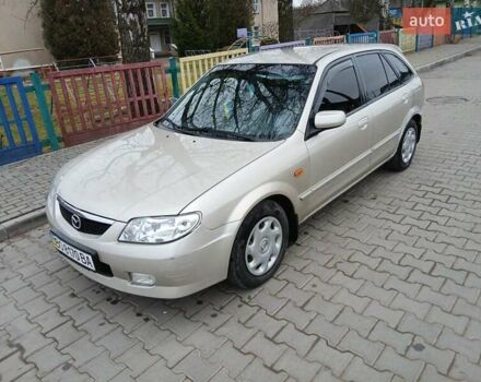 Бежевый Мазда 323, объемом двигателя 2 л и пробегом 210 тыс. км за 2550 $, фото 8 на Automoto.ua