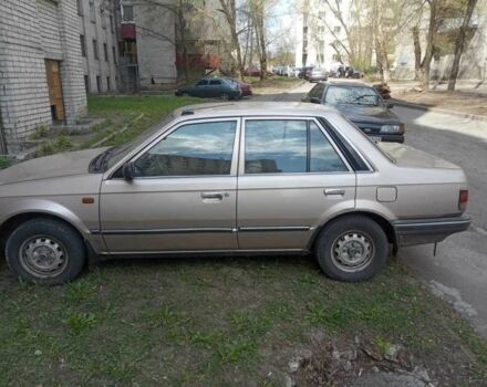 Бежевый Мазда 323, объемом двигателя 1.3 л и пробегом 300 тыс. км за 750 $, фото 2 на Automoto.ua