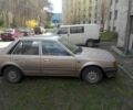 Бежевый Мазда 323, объемом двигателя 1.3 л и пробегом 300 тыс. км за 750 $, фото 1 на Automoto.ua