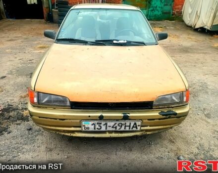 Бежевий Мазда 323, об'ємом двигуна 1.5 л та пробігом 500 тис. км за 740 $, фото 2 на Automoto.ua