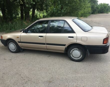 Бежевый Мазда 323, объемом двигателя 1.7 л и пробегом 360 тыс. км за 1800 $, фото 3 на Automoto.ua