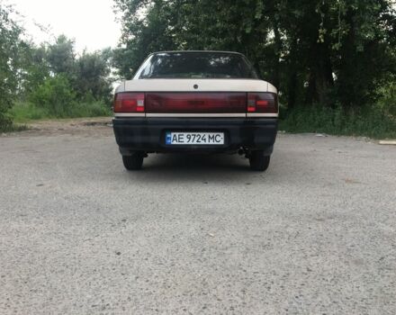 Бежевый Мазда 323, объемом двигателя 1.7 л и пробегом 360 тыс. км за 1800 $, фото 1 на Automoto.ua