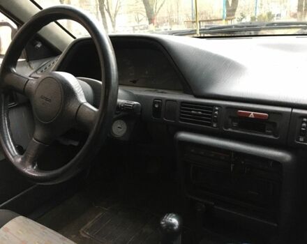 Бежевый Мазда 323, объемом двигателя 1.7 л и пробегом 360 тыс. км за 1800 $, фото 5 на Automoto.ua