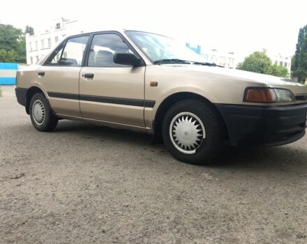 Бежевый Мазда 323, объемом двигателя 1.7 л и пробегом 360 тыс. км за 1800 $, фото 2 на Automoto.ua