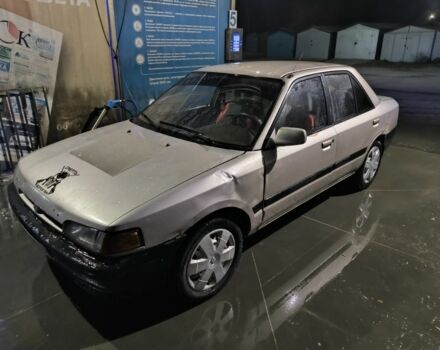 Бежевый Мазда 323, объемом двигателя 1.6 л и пробегом 300 тыс. км за 715 $, фото 2 на Automoto.ua
