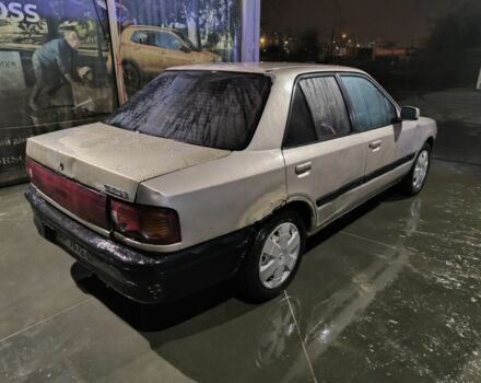 Бежевый Мазда 323, объемом двигателя 1.6 л и пробегом 300 тыс. км за 715 $, фото 5 на Automoto.ua