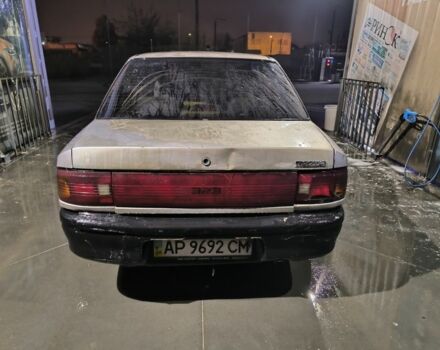 Бежевый Мазда 323, объемом двигателя 1.6 л и пробегом 300 тыс. км за 715 $, фото 4 на Automoto.ua