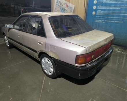 Бежевый Мазда 323, объемом двигателя 1.6 л и пробегом 300 тыс. км за 715 $, фото 3 на Automoto.ua