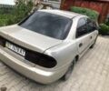 Бежевый Мазда 323, объемом двигателя 1.8 л и пробегом 360 тыс. км за 1000 $, фото 1 на Automoto.ua