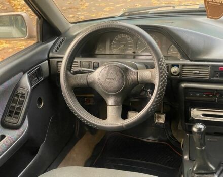 Бежевий Мазда 323, об'ємом двигуна 1.6 л та пробігом 400 тис. км за 899 $, фото 13 на Automoto.ua