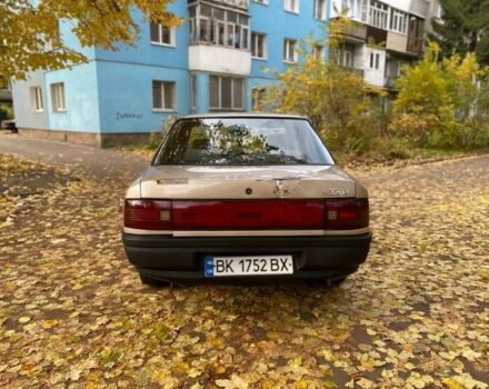 Бежевий Мазда 323, об'ємом двигуна 1.6 л та пробігом 400 тис. км за 899 $, фото 4 на Automoto.ua