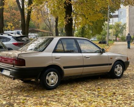 Бежевий Мазда 323, об'ємом двигуна 1.6 л та пробігом 400 тис. км за 899 $, фото 6 на Automoto.ua