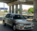 Бежевый Мазда 323, объемом двигателя 1.5 л и пробегом 300 тыс. км за 750 $, фото 1 на Automoto.ua