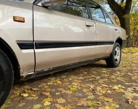 Бежевий Мазда 323, об'ємом двигуна 1.6 л та пробігом 400 тис. км за 899 $, фото 10 на Automoto.ua