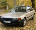 Бежевий Мазда 323, об'ємом двигуна 1.6 л та пробігом 400 тис. км за 899 $, фото 1 на Automoto.ua