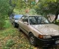 Бежевый Мазда 323, объемом двигателя 1.6 л и пробегом 200 тыс. км за 530 $, фото 1 на Automoto.ua