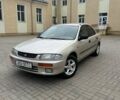 Бежевый Мазда 323, объемом двигателя 1.49 л и пробегом 280 тыс. км за 890 $, фото 1 на Automoto.ua