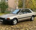 Бежевий Мазда 323, об'ємом двигуна 1.6 л та пробігом 400 тис. км за 899 $, фото 1 на Automoto.ua
