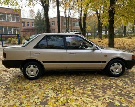 Бежевий Мазда 323, об'ємом двигуна 1.6 л та пробігом 400 тис. км за 899 $, фото 7 на Automoto.ua