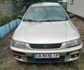 Бежевый Мазда 323, объемом двигателя 1.5 л и пробегом 400 тыс. км за 1785 $, фото 1 на Automoto.ua