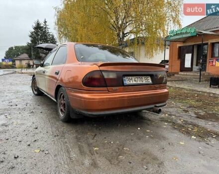 Бежевий Мазда 323, об'ємом двигуна 1.5 л та пробігом 300 тис. км за 1500 $, фото 2 на Automoto.ua