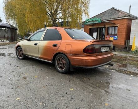 Бежевий Мазда 323, об'ємом двигуна 1.5 л та пробігом 300 тис. км за 1500 $, фото 1 на Automoto.ua