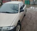 Бежевый Мазда 323, объемом двигателя 1.5 л и пробегом 250 тыс. км за 2700 $, фото 1 на Automoto.ua