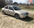 Бежевый Мазда 323, объемом двигателя 1.5 л и пробегом 270 тыс. км за 2500 $, фото 1 на Automoto.ua