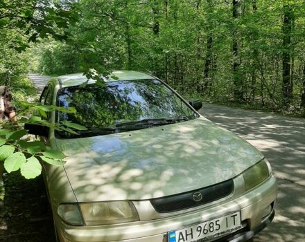 Бежевый Мазда 323, объемом двигателя 1.5 л и пробегом 290 тыс. км за 2100 $, фото 4 на Automoto.ua