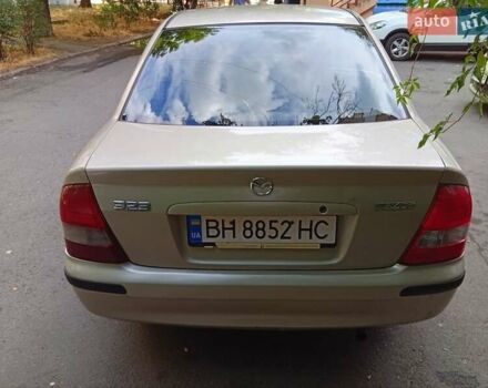 Бежевый Мазда 323, объемом двигателя 1.6 л и пробегом 306 тыс. км за 3000 $, фото 5 на Automoto.ua
