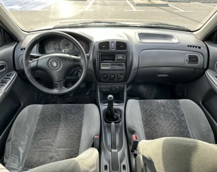 Бежевый Мазда 323, объемом двигателя 1.8 л и пробегом 524 тыс. км за 2700 $, фото 5 на Automoto.ua