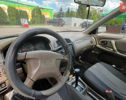 Бежевий Мазда 323, об'ємом двигуна 1.5 л та пробігом 81 тис. км за 4200 $, фото 6 на Automoto.ua