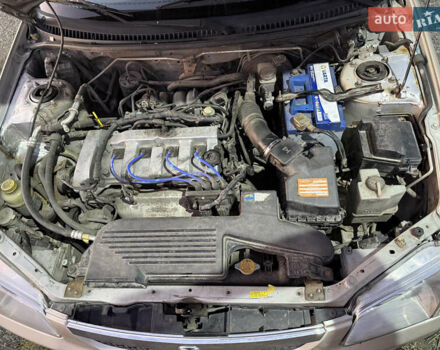 Бежевый Мазда 323, объемом двигателя 1.84 л и пробегом 512 тыс. км за 2029 $, фото 20 на Automoto.ua