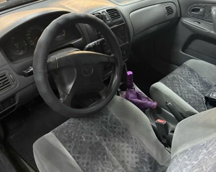 Бежевий Мазда 323, об'ємом двигуна 0 л та пробігом 250 тис. км за 650 $, фото 3 на Automoto.ua