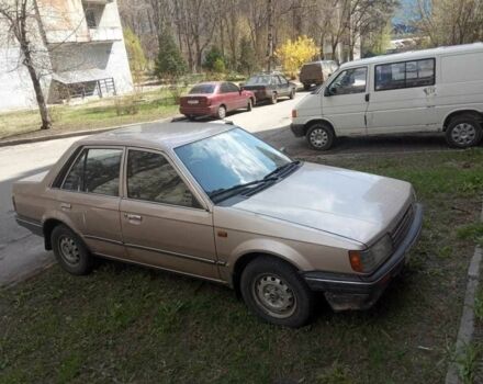Бежевый Мазда 323, объемом двигателя 1.3 л и пробегом 300 тыс. км за 750 $, фото 1 на Automoto.ua