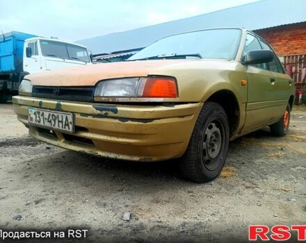 Бежевий Мазда 323, об'ємом двигуна 1.5 л та пробігом 500 тис. км за 740 $, фото 1 на Automoto.ua