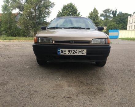 Бежевый Мазда 323, объемом двигателя 1.7 л и пробегом 360 тыс. км за 1800 $, фото 1 на Automoto.ua