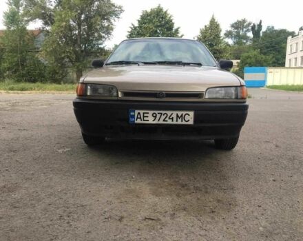 Бежевый Мазда 323, объемом двигателя 1.7 л и пробегом 360 тыс. км за 1800 $, фото 1 на Automoto.ua