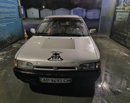 Бежевый Мазда 323, объемом двигателя 1.6 л и пробегом 300 тыс. км за 715 $, фото 1 на Automoto.ua